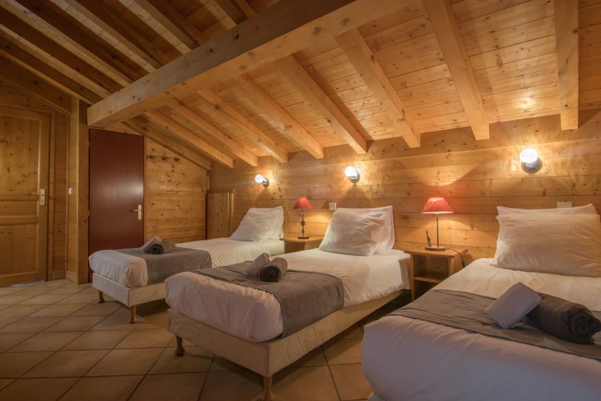 Triple bedroom in Chalet Novelin
