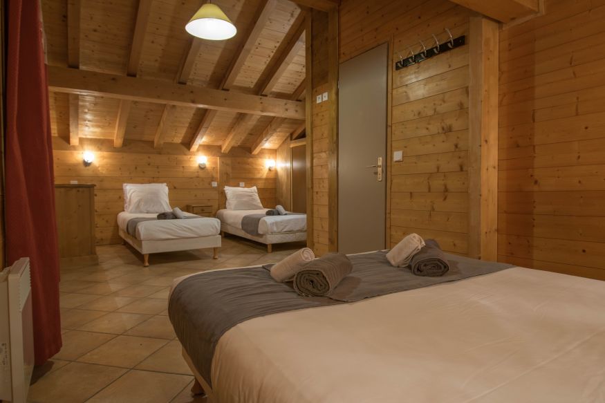 Triple bedroom in Chalet Novelin