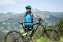 Woman and her mountain bike in Les Gets, France