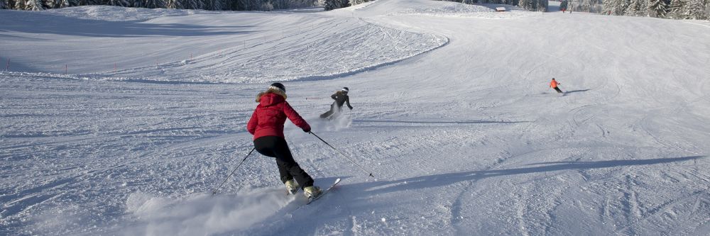 Man SKiing on rented Skis in Les Gets