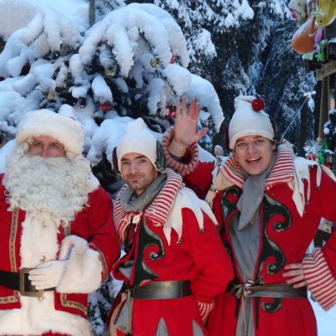 Father Christmas arriving in Les Gets with torches