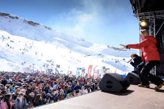 Piste bashers at work by night in Les Gets
