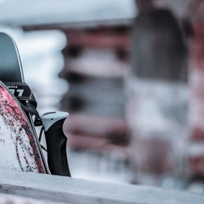 Child making snowballs in Les Gets